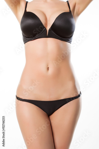 beautiful female figure. sexy body in black underwear.