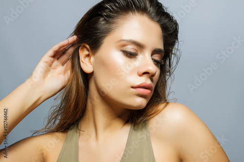 portrait of a beautiful girl with big lips on a blue background