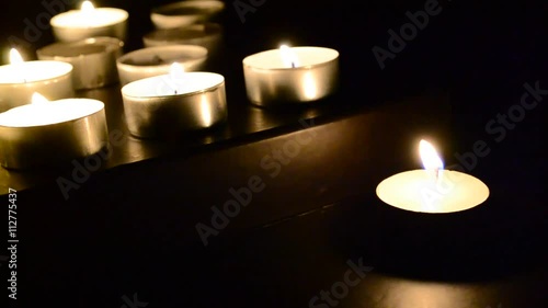 Burning candles in the dark
