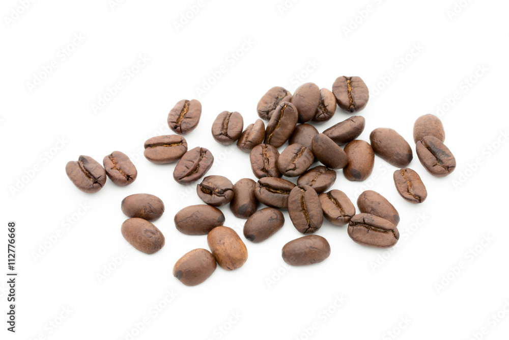 Coffee grains and leaves isolated on the white backgrounds. Coffee grains and leaves isolated on the white backgrounds.