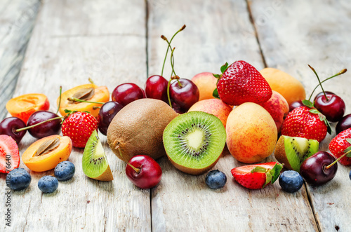 fruits and berries in the form of jar