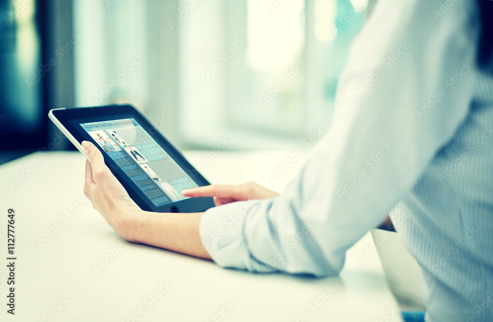close up of woman hands with tablet pc at office close up of woman hands with tablet pc at office