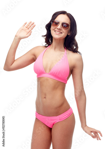 happy woman in sunglasses and bikini swimsuit © Syda Productions