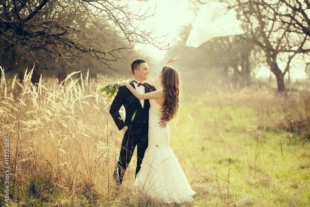 Wedding couple walking outdoor Wedding couple walking outdoor