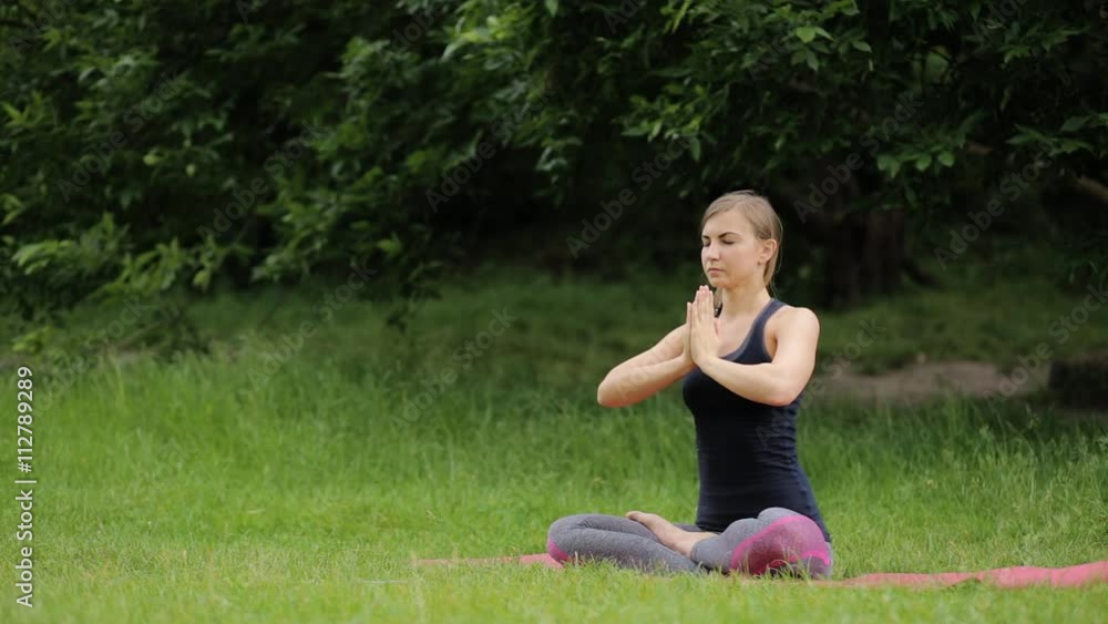 Young Attractive Woman Doing Yoga In Beautiful Natural Surroun Young Attractive Woman Doing Yoga In Beautiful Natural Surroun