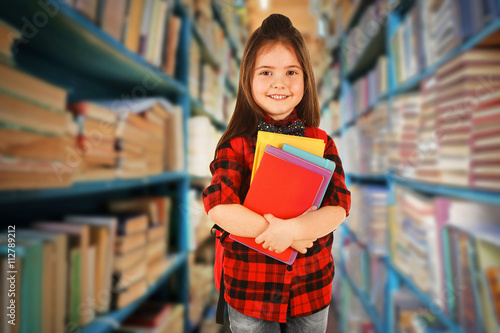 Girl with books in school l...