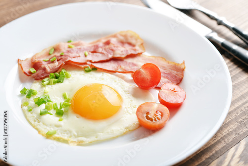 Bacon with sunny side up egg