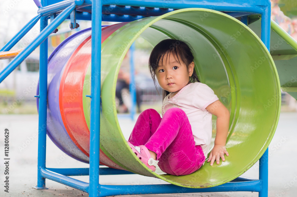 Happy kid, asian baby child playing on playground Happy kid, asian baby child playing on playground