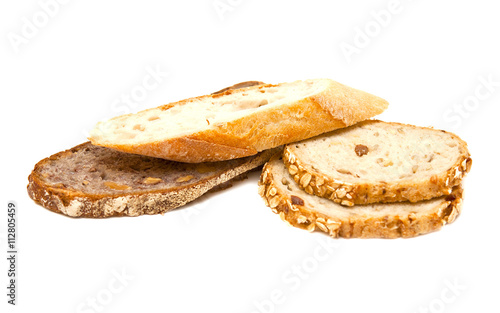 Several pieces of bread on a white background