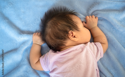 1-month-old baby was sleeping. select focus