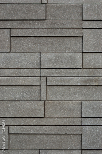 Brick walls are arranged in a straight pattern background.