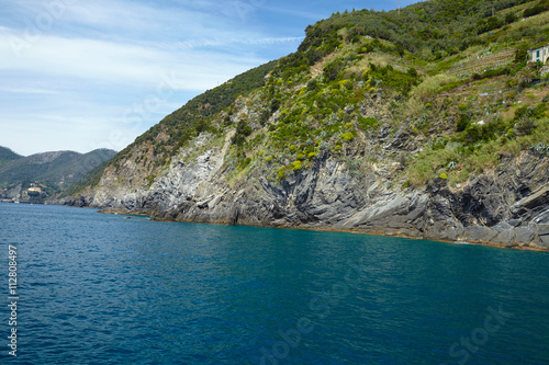 .Calm Mediterranean sea and coast of Italian's Cinque Terre National Park