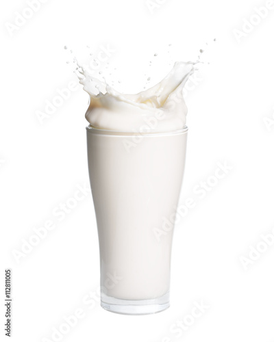 Splash of milk from the glass on a white background.