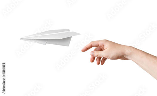 Foto Hand is throwing origami paper airplane