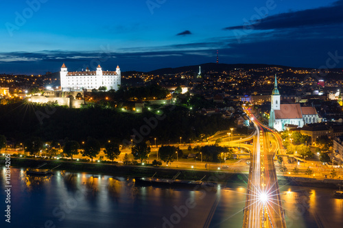 Bratislava, Slovakia - Castle, parliament and St. Martin cathedral, sunset view from observation deck of the Bridge