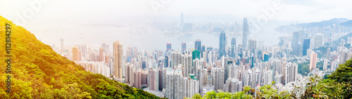 Business concept for real estate and corporate construction - panoramic modern city skyline bird eye aerial view with dramatic sunrise and morning blue sky in Hong Kong  HK   China