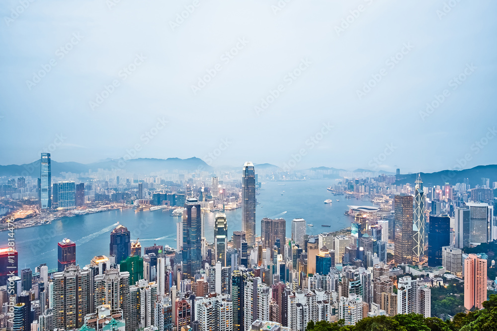 Business concept for real estate and corporate construction - panoramic modern city skyline bird eye aerial view with night sky in Hong Kong (HK), China