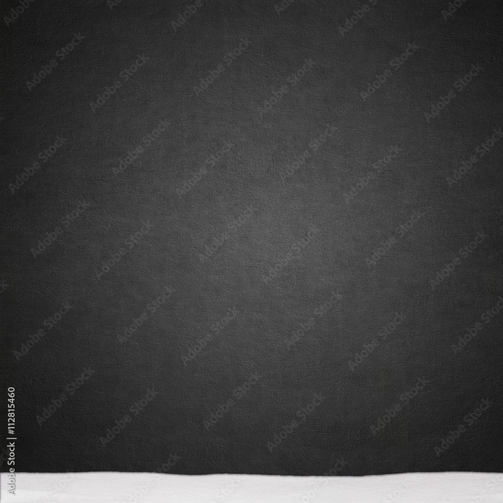 black stucco wall and snow texture background