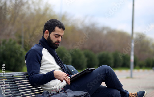 Canvas Print Young man working outdoor