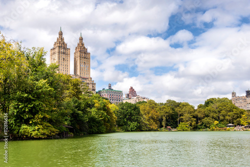 New York City Central Park fountain and urban Manhattan skyline