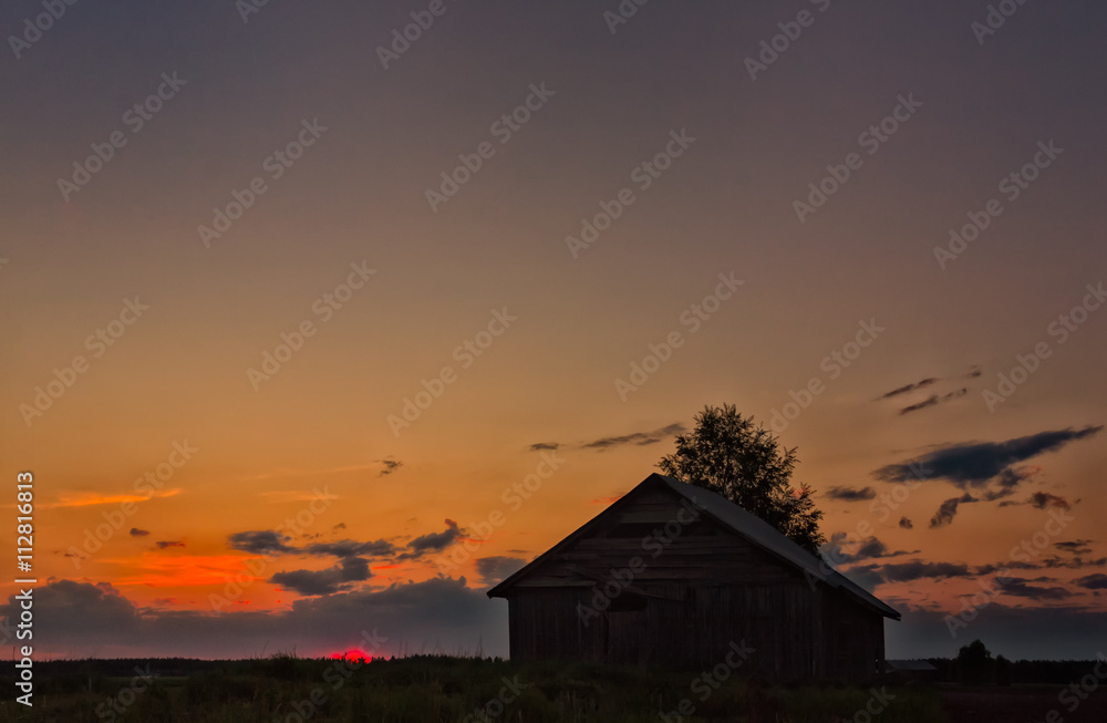 Sunset And An Old Barn House