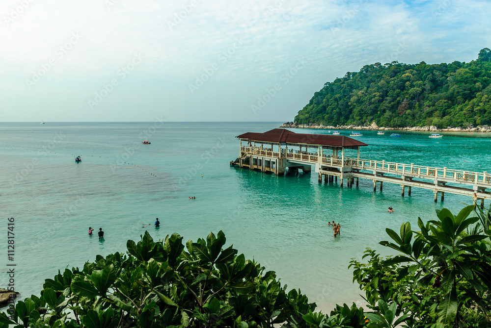 scenery in a beach with quay in the island Besar in Perhentian Islands, Malaysia