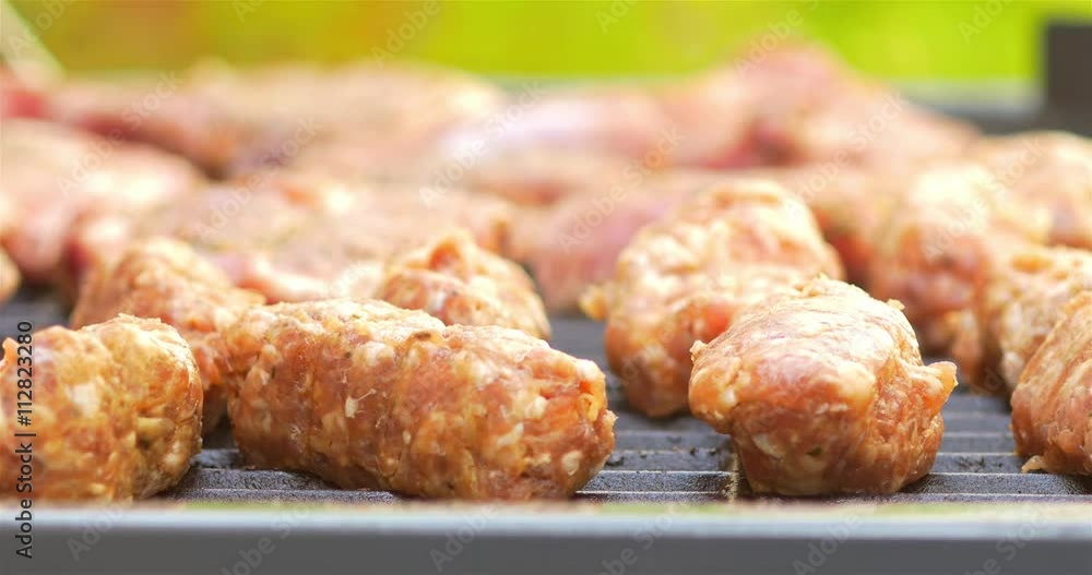Preparing Traditional Romanian Barbecue With Pork Meat Rolls And Stakes Preparing Traditional Romanian Barbecue With Pork Meat Rolls And Stakes