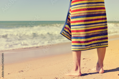 Closeup on legs of sexy romantic man walking outside on beach celebrating joyful vacation. Sunny weather clean air © aquar