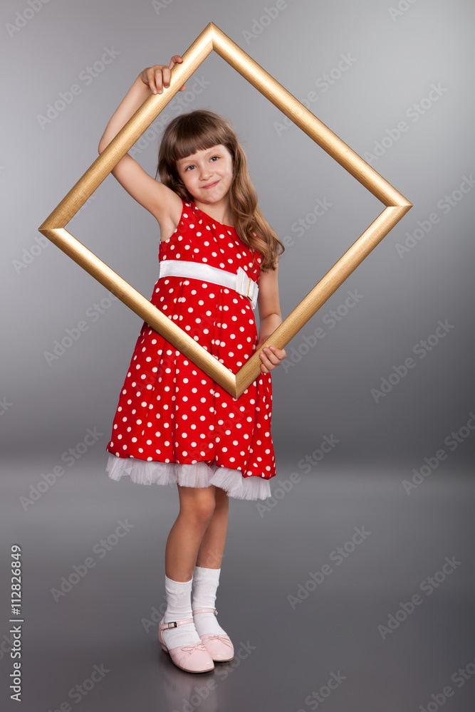Beautiful girl holding an empty frame Beautiful girl holding an empty frame