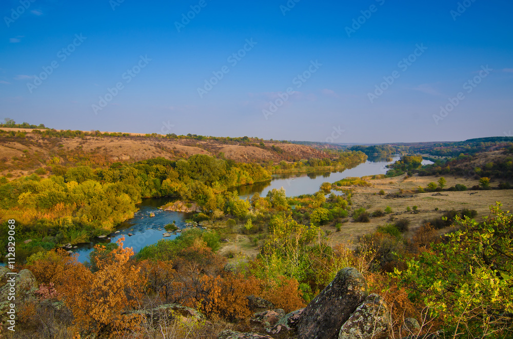 Rural autumn sunrise landscape with river and  colorful trees, seasonal background
