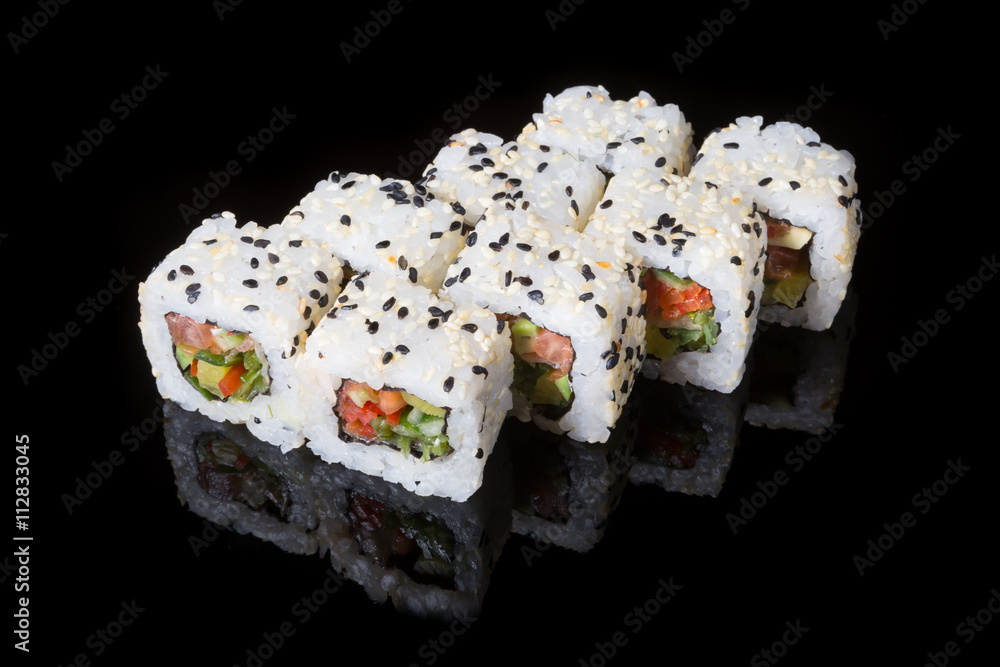 Japanese rolls on black background