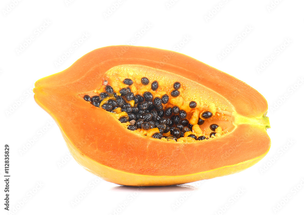 Papaya cut half on white background. Papaya cut half on white background.