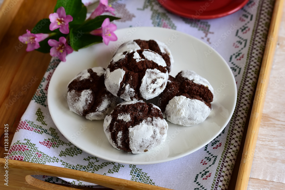 chocolate cakes in powdered sugar chocolate cakes in powdered sugar