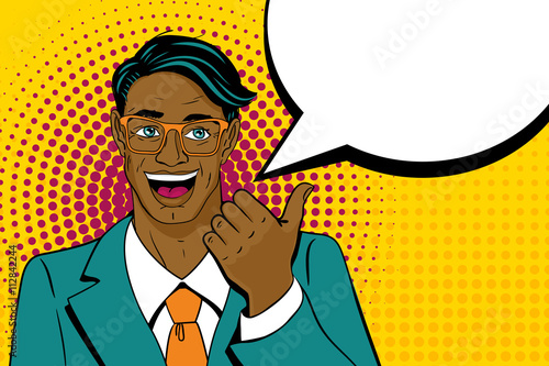 Young surprised afro american man with open mouth pointing finger with speech bubble in pop art retro style. Vintage vector character. Pop art vector background.