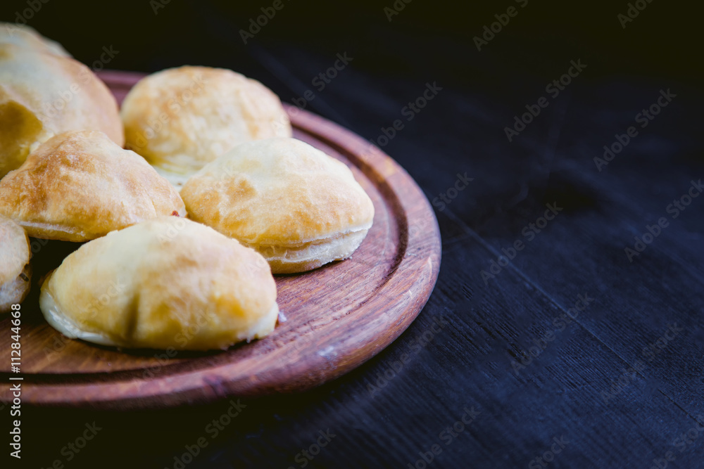 Delicious pies on wooden Boards, tasty dish Delicious pies on wooden Boards, tasty dish