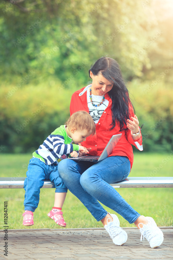 Summer time in the city park... A mother and daughter