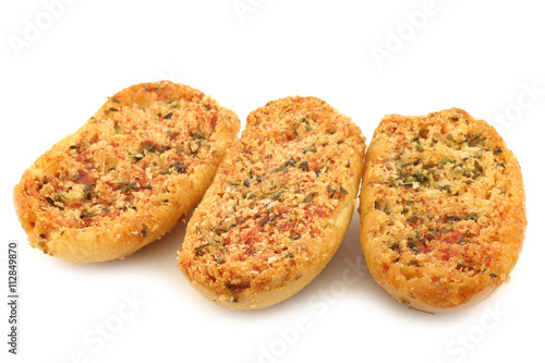 freshly baked Italian bread with garlic and herbs on a white background