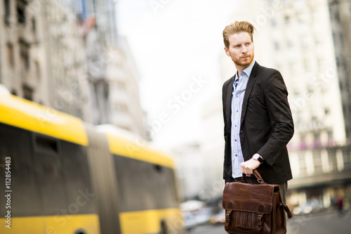 Young businessman standing ...