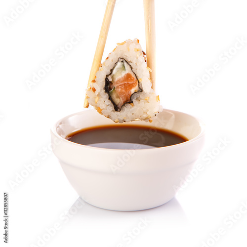 Roll the delicious sushi on a background.