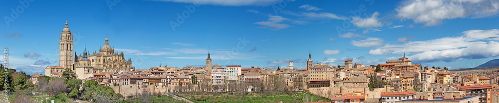 SEGOVIA, SPAIN, APRIL - 14, 2016: Cathedral Nuestra Senora de la Asuncion y de San Frutos de Segovia  and the panorama of the town.