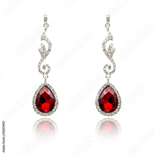 Pair of ruby diamond earrings isolated on white