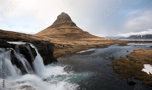 Kirkjufellsfoss waterfalls and Kirkjufell mountain Iceland