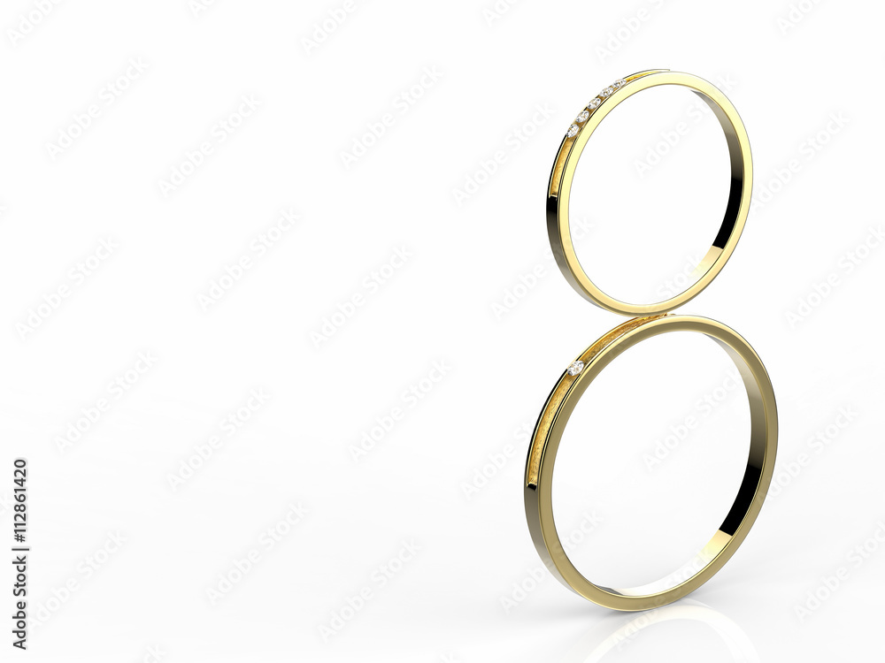 golden wedding rings on white background golden wedding rings on white background