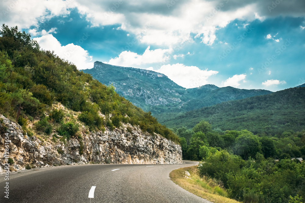 Fototapeta premium Mountain Road Under Sunny Blue Sky. Verdon Gorge In France.