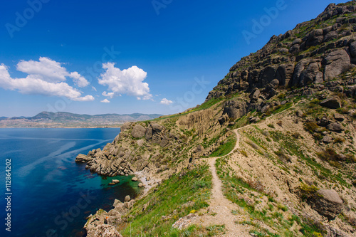 Coastal rocks, coastline, rocky shore, view from the sea, the Peninsula of the Crimea, the Black sea coast