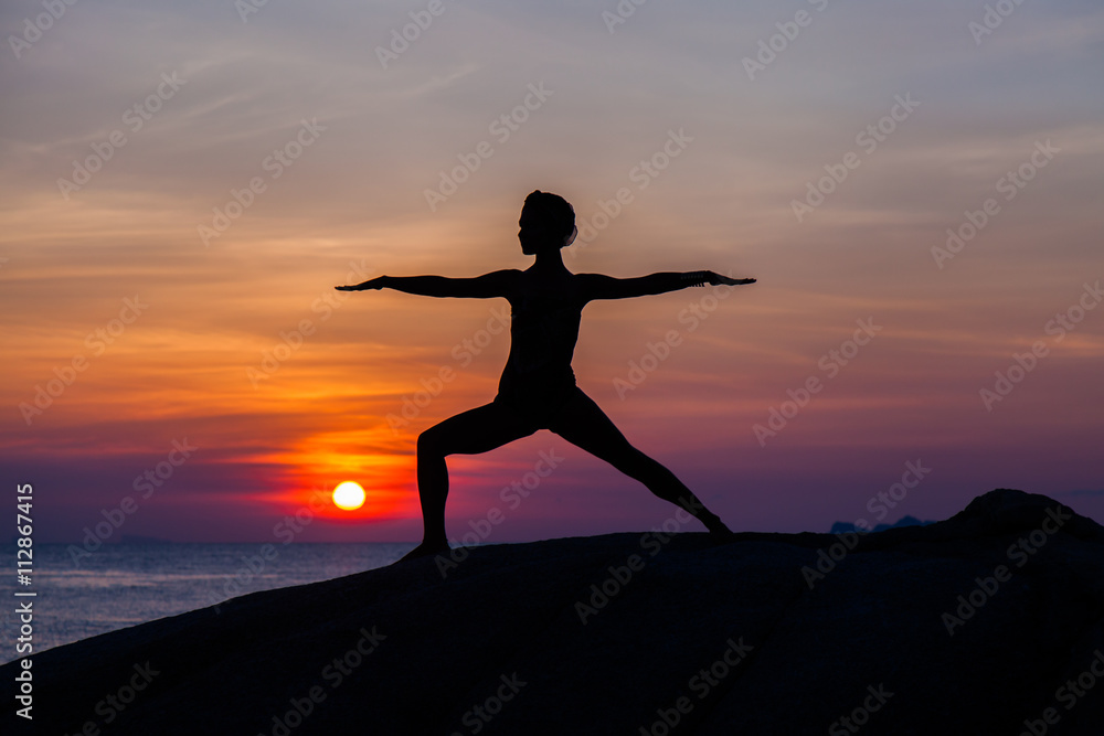 Yoga at sunset time