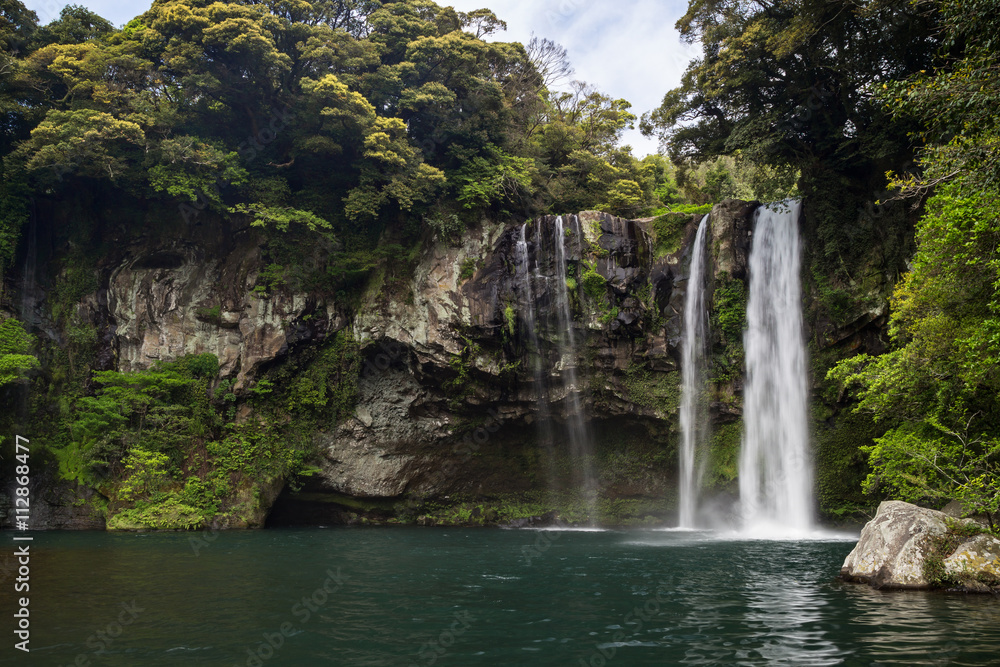 Fototapeta premium Cheonjiyeon Waterfall on Jeju Island in South Korea.