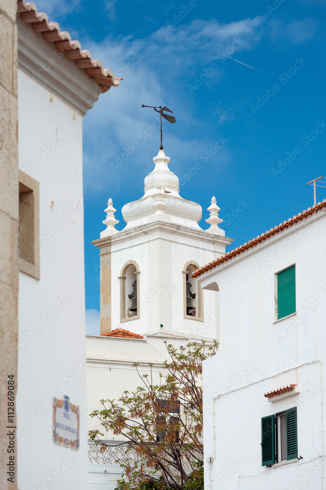 Church bell tower of Igreja Matriz de Albufeira in old town, Portugal