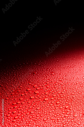 Shiny gradient black and red smooth surface photo