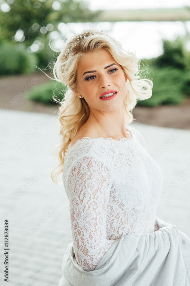 Beautiful young bride in luxury wedding dress Beautiful young bride in luxury wedding dress